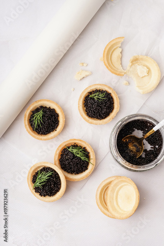 Tasty tartlets with black c...
