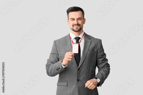 Young businessman with blan...