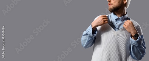 Fashionable young man on gr...
