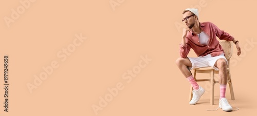 Stylish young bearded man s...