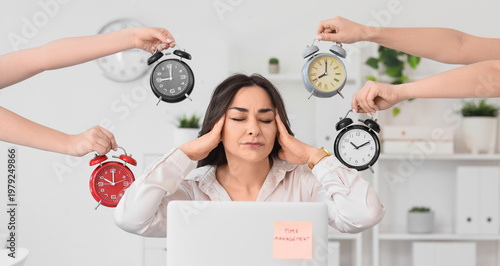 Stressed businesswoman and ...