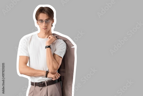 Fashionable young man on gr...