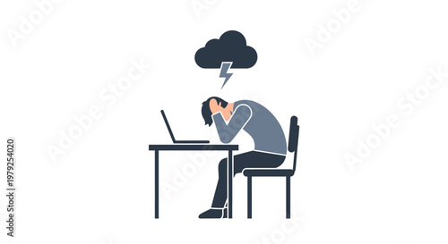 Man sitting at desk stressed.