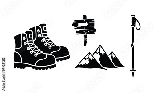 Hiking boots and trekking poles set.