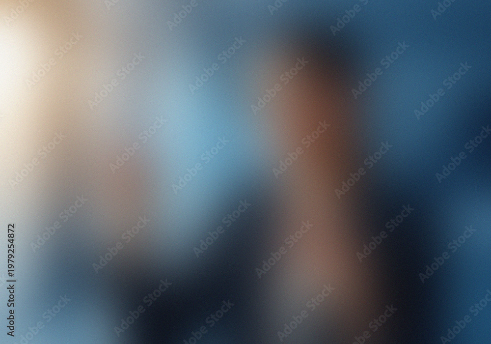 Obraz premium Blurred silhouette of a person standing against a gradient background