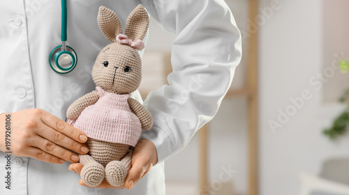 Female pediatrician with to...