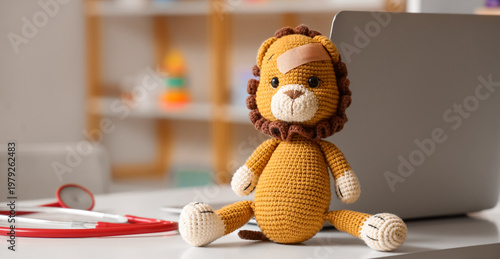 Toy with stethoscope and la...