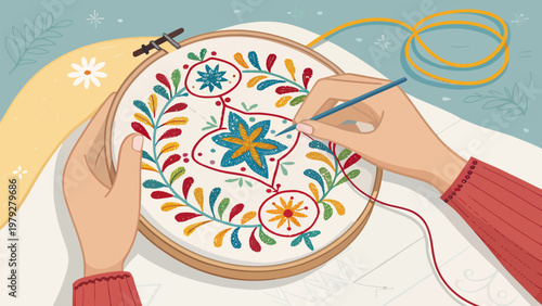 Hands stitching colorful patterns in an embroidery hoop with floral designs and vibrant threads on a table