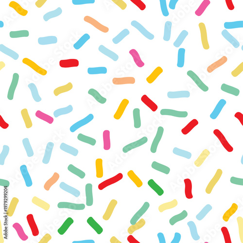 Multicolored sprinkles on white icing seamless vector pattern. A fun print for holidays and bakeries. Cute abstract donut icing endless background.