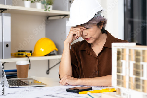 Schilderij op canvas Stressful  Enginee working with drawings inspection reviews  shop drawing construction Blueprint