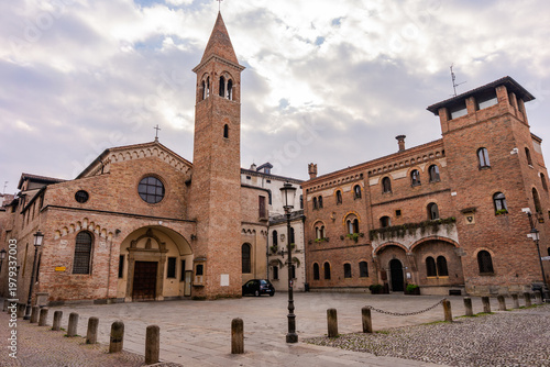 Panoramic view of the historic Piazzetta Lucia Valentini Terrani featuring the Chiesa di San Canziano and its medieval brick bell tower in Padova, Italy 02.01.2026