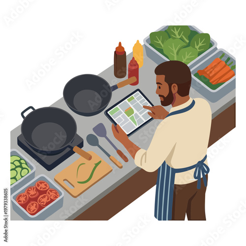 Man cooking in kitchen with vegetables and tablet showing recipe