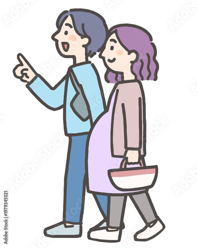 お出かけをする妊娠中の妻と夫の若い夫婦
