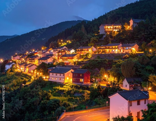A picturesque village nestled on a hillside glows warmly under the twilight sky, showcasing traditional architecture and a serene atmosphere.