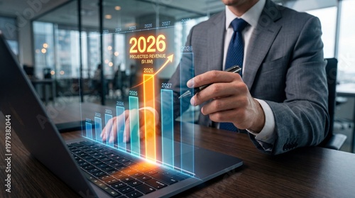 Business professional analyzing 2026 financial growth charts on laptop in modern office with futuristic data visualization