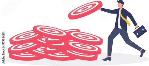 Professional picking up a target from a pile of targets