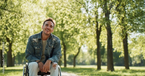 The man in a wheelchair enjoying a sunlit park pathway with a joyful smile