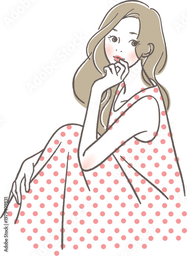 頬に手を当て座る女性