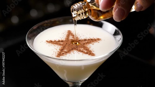Wallpaper Mural Bartender Pouring Liqueur into a Creamy White Cocktail Garnished with a Star-Shaped Cocoa Powder Design Torontodigital.ca