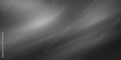 Brushed silver metallic texture with a polished stainless steel surface featuring a dark gray chrome pattern on a smooth shiny aluminum plate backdrop for a sleek black metal background design