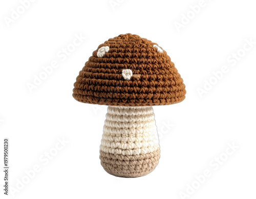 A charming crocheted mushroom toy sits against a stark black background, showcasing its textured details and whimsical design.