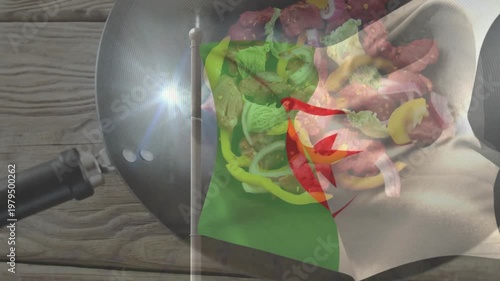 Algerian flag overlay appearing, hand placing spreading peppers onions meat into pan for recipe