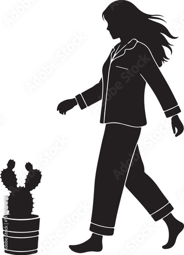 Woman walking past cactus