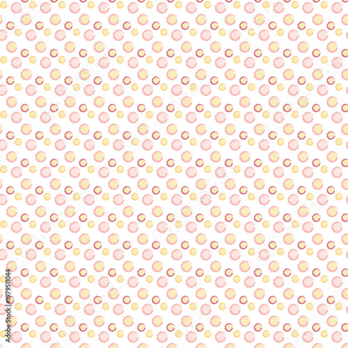 Seamless pastel polka dot pattern with soft pink and yellow circles on a light background. Delicate and feminine design perfect for fabric, packaging, and decor.