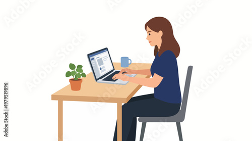 Woman sitting at desk working on laptop with coffee and plant nearby