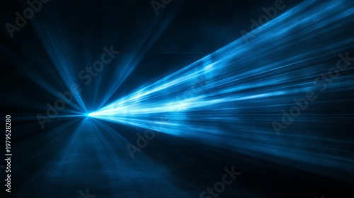 A bright blue light beam radiates from a central point in a dark background