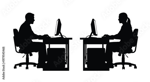 Two people working at computers facing each other a stark silhouette