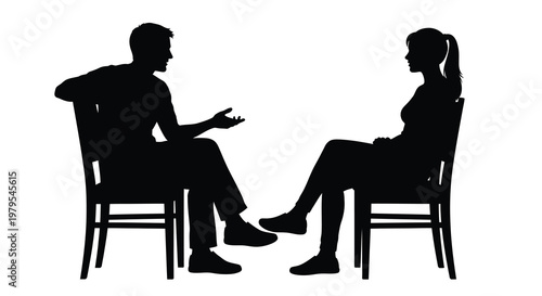 Tablou pe pânză Two people in conversation seated facing each other black silhouette