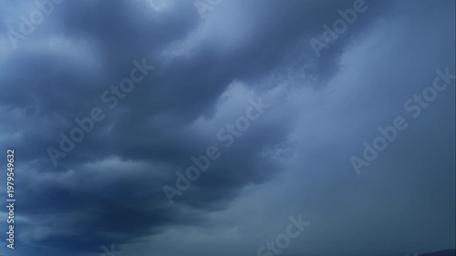 Dramatic Timelapse of Stormy Dark Clouds Moving Across Overcast Sky