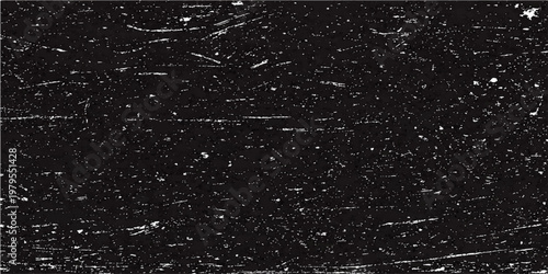 Abstract Black Grunge Texture with scratches and light spots, creating a backdrop perfect for adding depth and texture.
