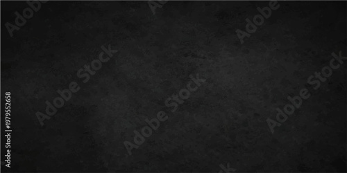 A simple, yet versatile, dark black grunge background, ideal for creating depth and drama in any design.