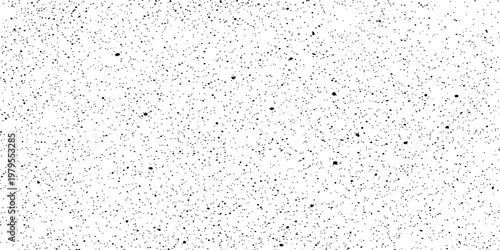 Tiny scattered specks against a textured backdrop, evoking a sense of subtle visual interest and depth.