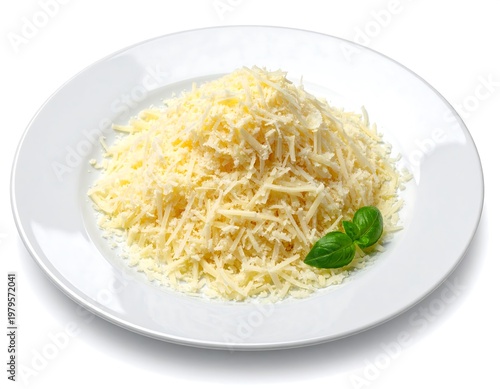 Pile of Grated Parmesan Cheese on a White Plate with Basil.