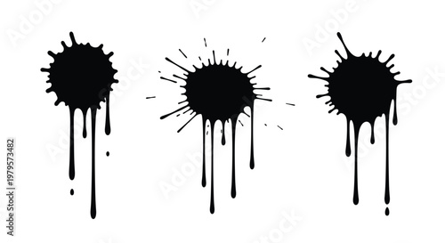 Set of three black ink splatters with liquid drips creating artistic stains on a plain white background for design use.