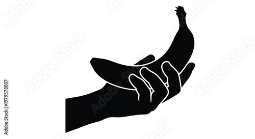 A hand gently holding a curved banana striking black silhouette