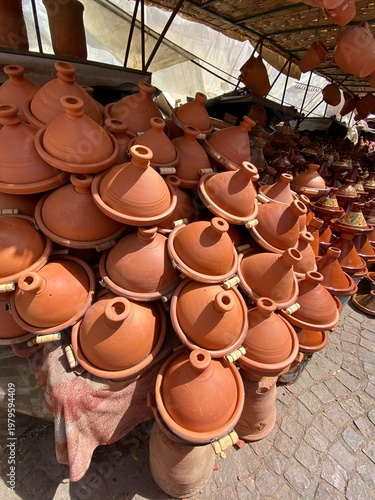 Clay tagines in the souk for sale in Marrakech, Morocco.