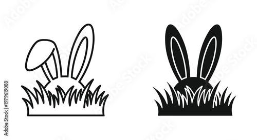 Silhouette of bunny ears and heads hidden in grass for spring Easter