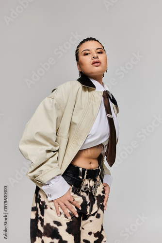 Stylish young woman showcasing bold fashion choices in a contemporary indoor setting