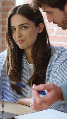 Young Professionals Collaborating on a Project, Sharing Ideas and Achieving Success.