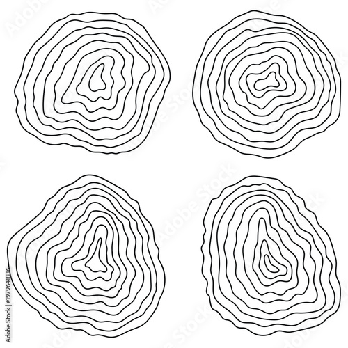Hand-drawn doodle set of tree trunk cross sections on a white background.