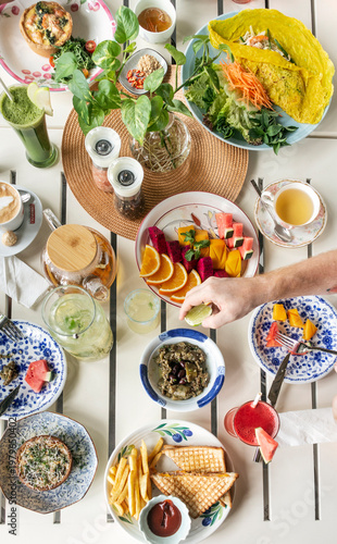 mixed western healthy food meal on restaurant table outdoors in singapore restaurant