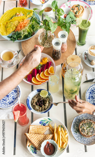 mixed western healthy food meal on restaurant table outdoors in singapore restaurant