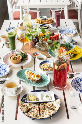 mixed western healthy food meal on restaurant table outdoors in singapore restaurant