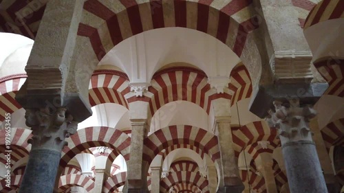 Corinthian capitals and arches in Cordoba mosque interior historic architecture Spain