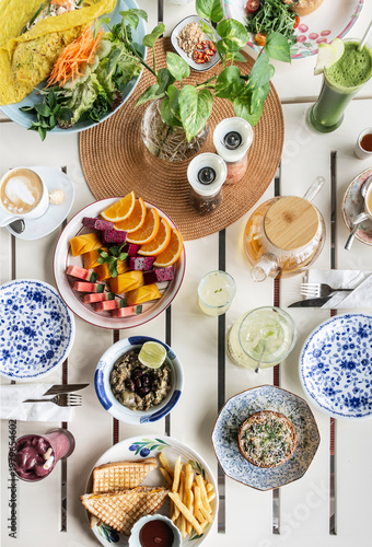 mixed western healthy food meal on restaurant table outdoors in singapore restaurant