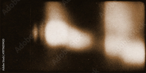 Vintage dark film projector light with old grunge textured wall background